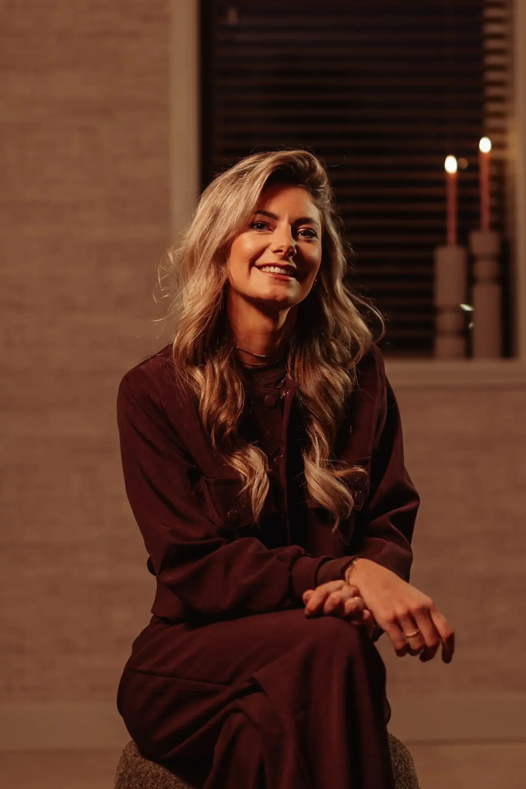 Elenita Verhagen, founder of Cèlia Blu, seated and smiling