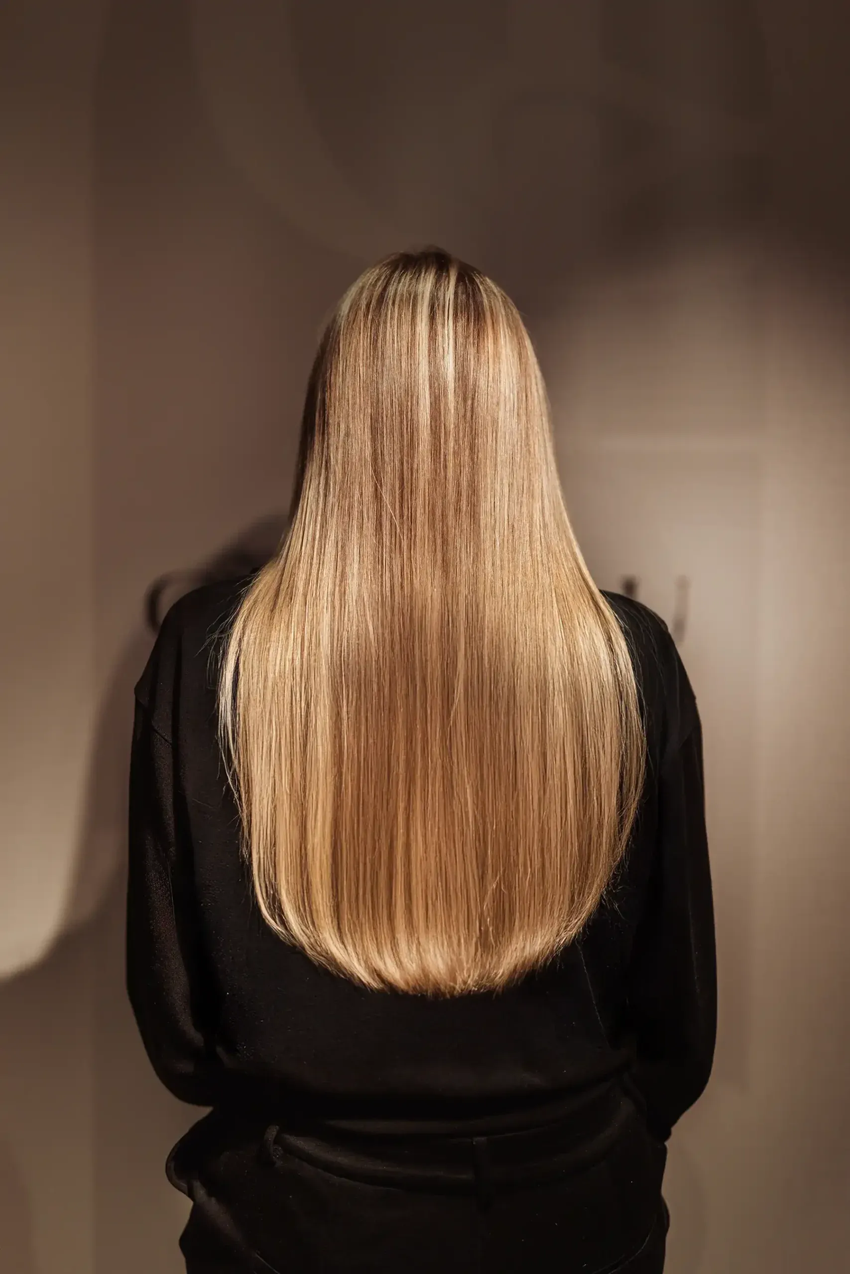 Na: lang blond haar na de cosmetische haaroplossing